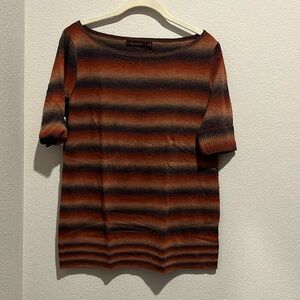 Limited sweater, open neck, fall colors.